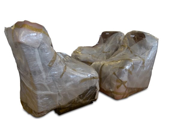 wrapped up sofas waiting for delivery photo of sofas wrapped up for a delivery