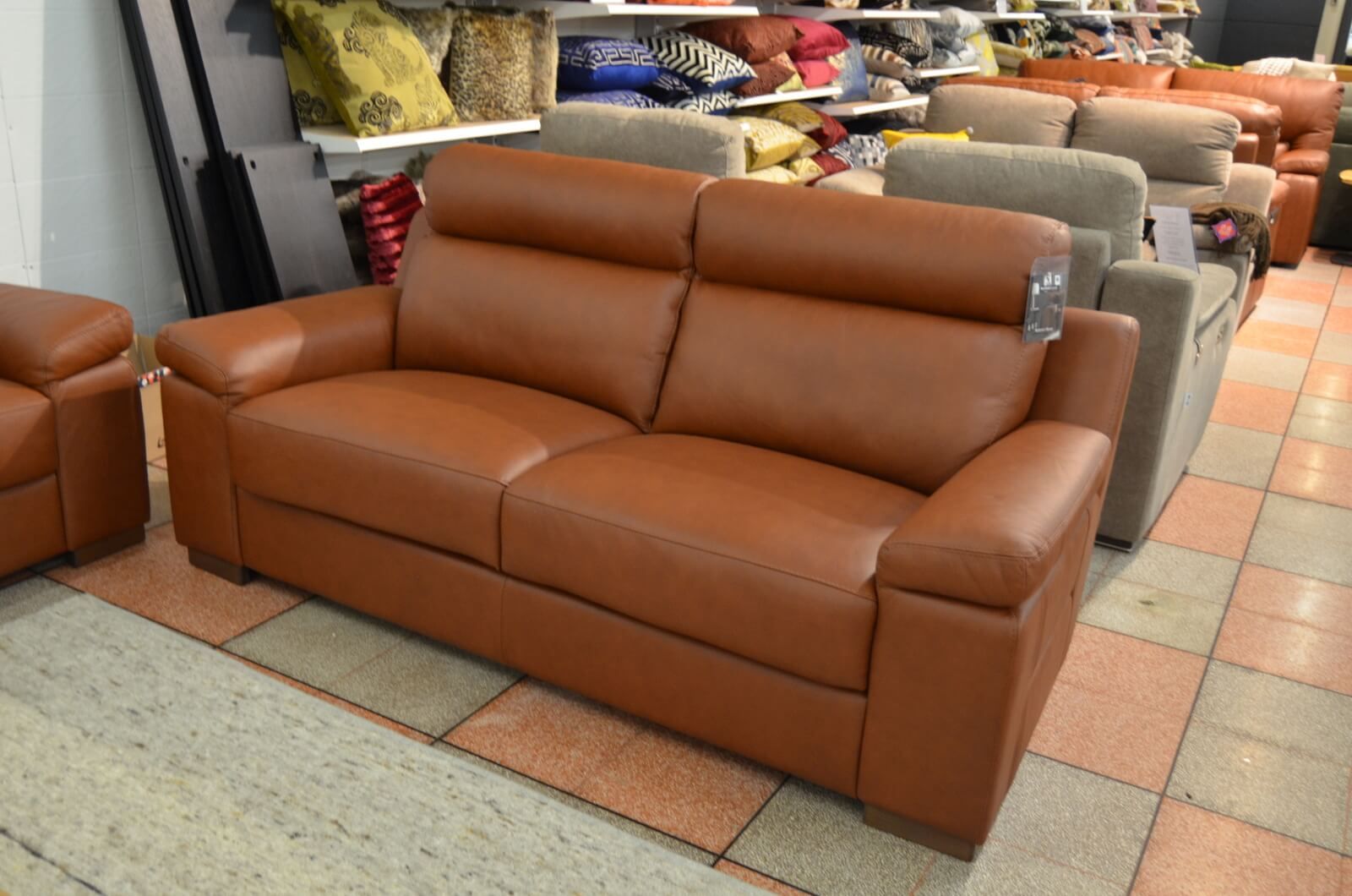 Leather sofa deals outlet near me