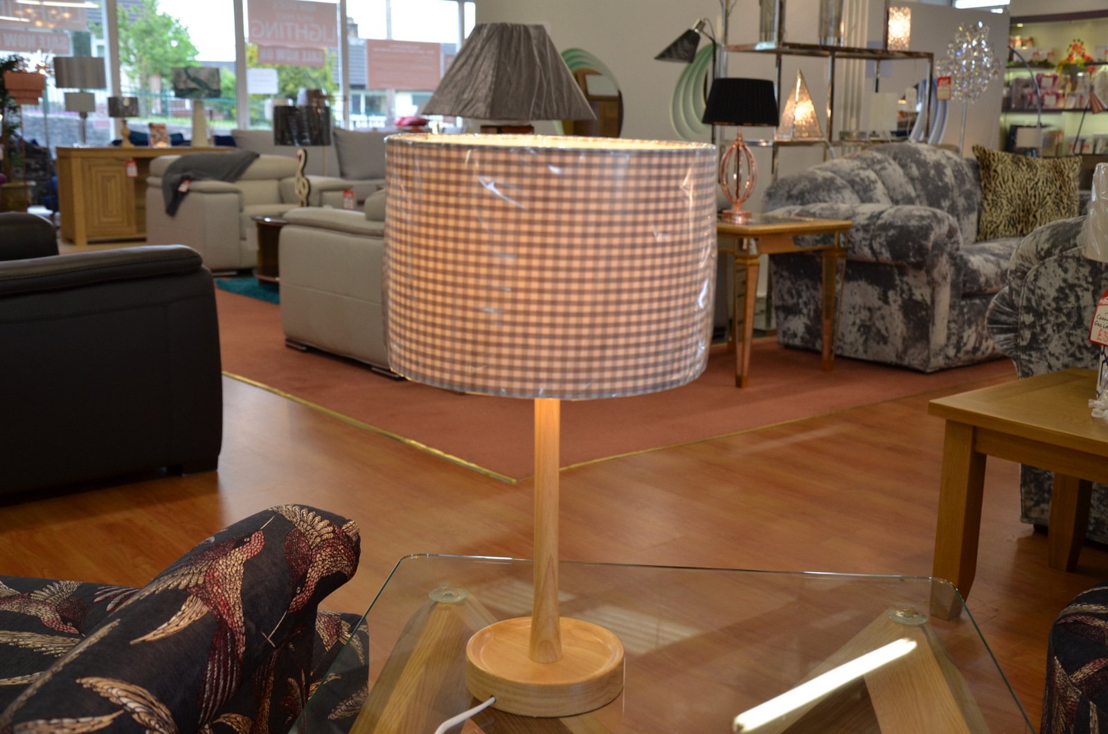 solid oak Oakton floor and table lamps now half price at our lighting showroom in Clitheroe Lancashire