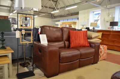 A brown Italian leather sofa being sold at a 75% discount at our furniture shop near Bolton